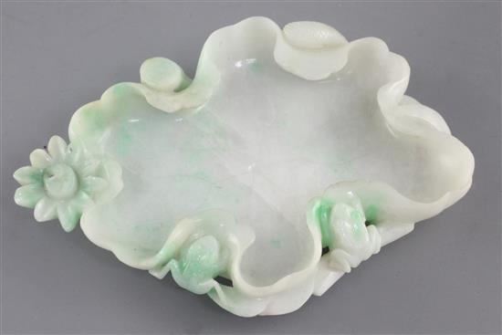A Chinese jadeite lotus leaf brushwasher, length 15.5cm, tiny chips to a few edges